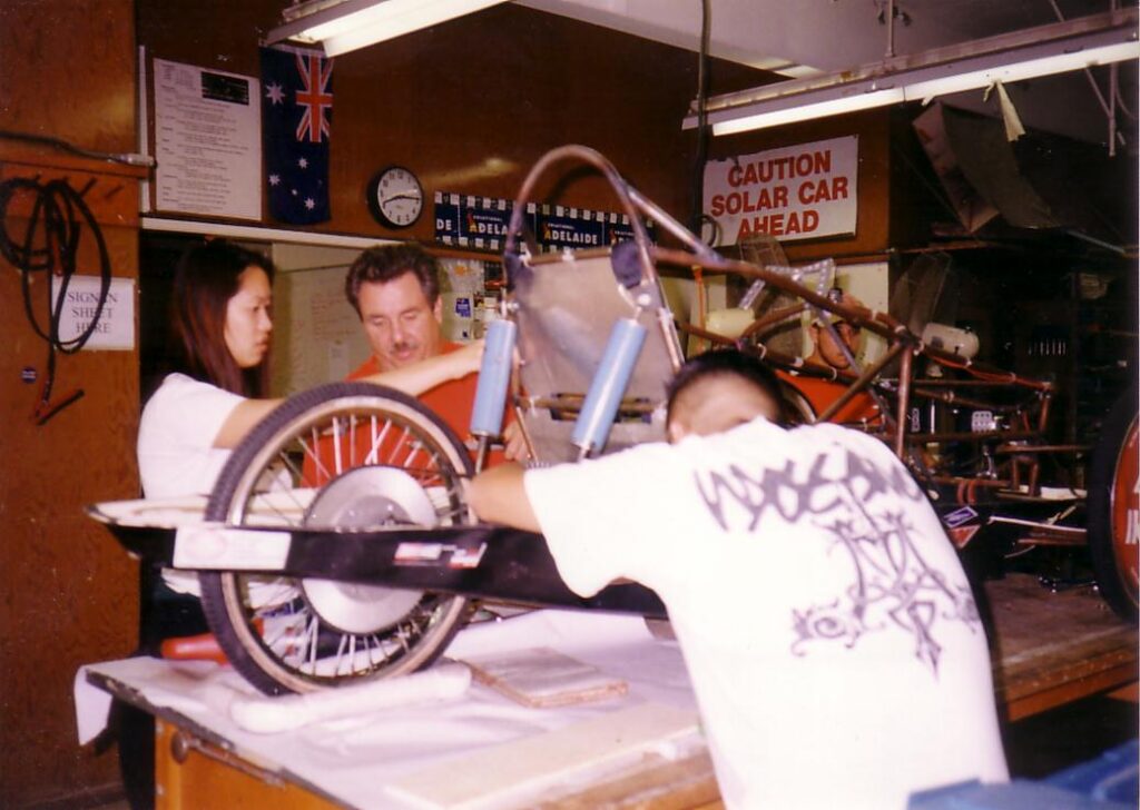 Bob Franz working with students on Speed Racer